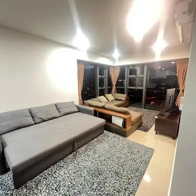 a living room with a bed and a couch at EKO CHERAS mall kids play room Big sofa MRT 8 pex in Kuala Lumpur