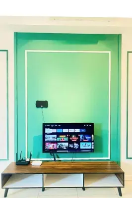 a flat screen tv sitting on top of a table at Chambers Kl by MRJ in Kuala Lumpur
