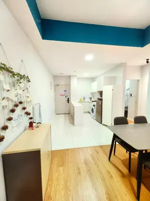 a kitchen and dining room with a table and chairs at Chamber Residence By SKY Rainbow in Kuala Lumpur