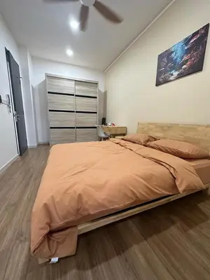 a bedroom with a large bed with a ceiling fan at Muji Feel Sunway Velocity 2 Link to Mall 2Br in Kuala Lumpur