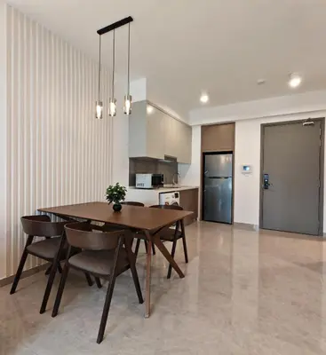 a kitchen and dining room with a table and chairs at Central of KL 1-5px - 10 mins TRX and Bukit Bintang in Kuala Lumpur