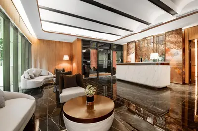 a living room with a couch and a table at Imperial KLCC by Premium Hospitality in Kuala Lumpur