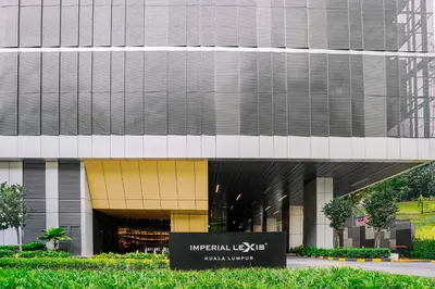 a building with a sign in front of it at Imperial KLCC by Premium Hospitality in Kuala Lumpur