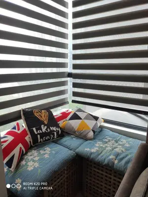 a bench in a window with pillows on it at Best & Affordable KL Arte Plus 2 bedroom Homestay in Kuala Lumpur