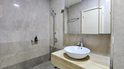 a bathroom with a sink and a shower at Bukit Bintang Fairlane Residence Pavilion KLCC #A25 in Kuala Lumpur