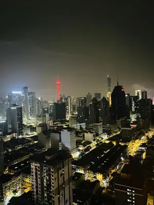 a city skyline at night with a red lighted city at Serenity Stay in Chambers Residence in Kuala Lumpur