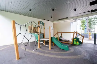 a room with a playground with a slide at KidsCastle Bukit Bintang Slide Family Friendly in Kuala Lumpur