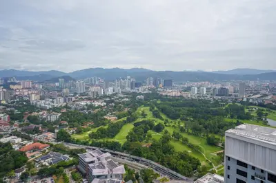 an aerial view of a city with buildings at KidsCastle Bukit Bintang Slide Family Friendly in Kuala Lumpur