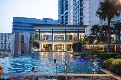 a large swimming pool in front of a building at Sunway Velocity Signature in Kuala Lumpur