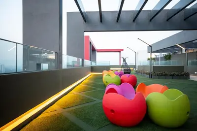 a row of colorful chairs on the floor of a building at Sunway Velocity Signature in Kuala Lumpur