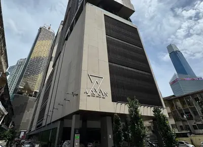 a building with the rxeyes logo on it at Axon Bukit Bintang Cozy 1BR Suite with KLCC View in Kuala Lumpur