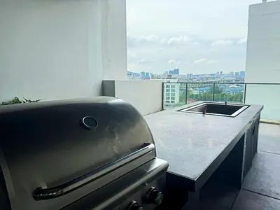 a kitchen with a counter with a sink and a window at KL Cheras at The Continew 5 pax in Kuala Lumpur
