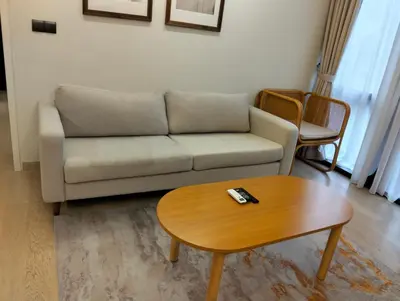 a living room with a couch and a coffee table at STAR Residences Popular By KLCC in Kuala Lumpur