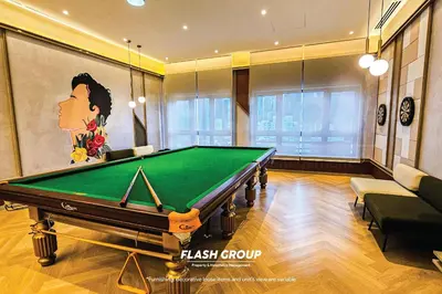 a billiard room with a pool table in it at Agile Bukit Bintang Premium Suites at KLCC in Kuala Lumpur