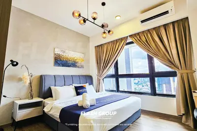 a bedroom with a bed and a large window at Agile Bukit Bintang Premium Suites at KLCC in Kuala Lumpur
