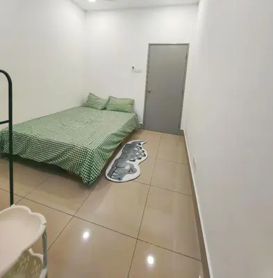 a small bedroom with a bed and a tiled floor at Razak City Residences dudu in Kuala Lumpur