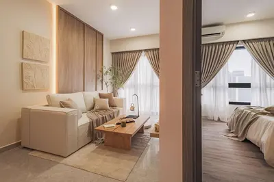 a living room with a couch and a table at Agile Bukit Bintang KLCC by DX in Kuala Lumpur