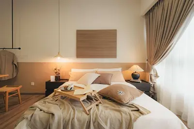 a bedroom with a large bed with a table on it at Agile Bukit Bintang KLCC by DX in Kuala Lumpur