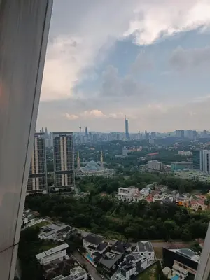 a view of a city from a building at Arte Mont Kiara 4BR 8pax-10pax, 10mins to KLCC in Kuala Lumpur