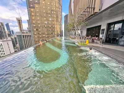 a pool of water in the middle of a city at Axon Bukit Bintang Lovely 1BR Suite with KL View in Kuala Lumpur