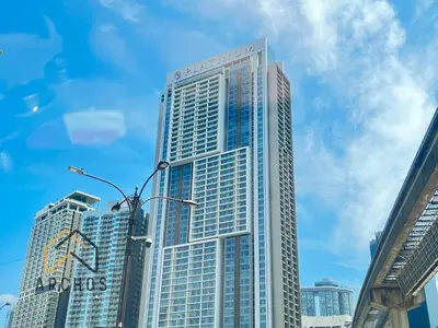 a tall building with many windows in a city at The Platinum KLCC by Archos in Kuala Lumpur