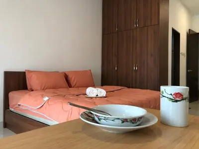 a bedroom with a bed and a bowl on a table at Ampang 2 -3 pax Studio Ampang Point in Ampang