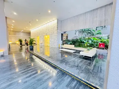 a lobby with a bowling alley in a building at Soha Homestay in Kuala Lumpur