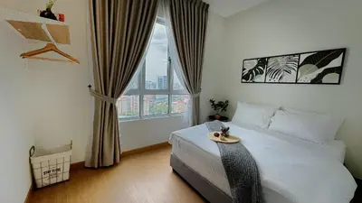 a bedroom with a bed and a large window at MH Platinum 2 COZY Fully Air-Con Suite Kuala Lumpur in Kuala Lumpur