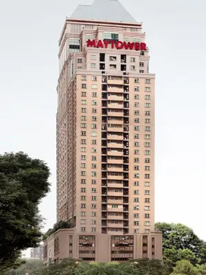 a tall building with a marriott sign on it at Gastfamilie maytower in Kuala Lumpur