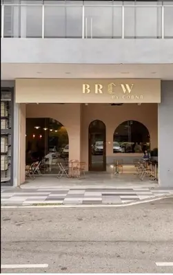 a facade of a building with a sign that reads brewlyn furniture at KL City, Neu Suites 2Bedroom 1Bathroom in Kuala Lumpur