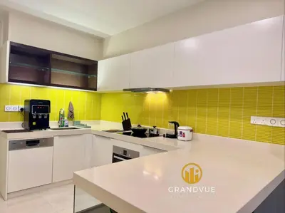 a kitchen with white cabinets and yellow tiles at Luxury Tropicana The Residence SkyPool KlccView CityCenter By HeyStay Management in Kuala Lumpur