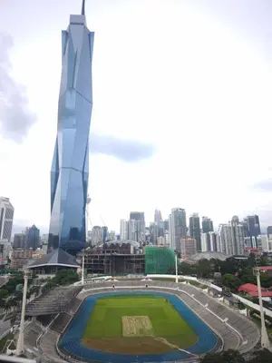 a view of a city with a building at 8Pax Green View next to KL118 ChinaTown n Train Station in Kuala Lumpur