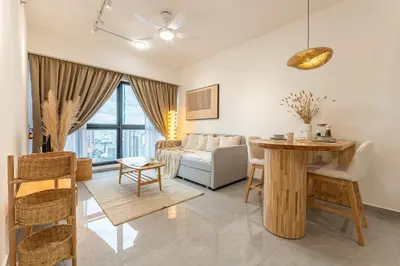 a living room with a table and a couch at TRX View Muji Room 5 min to Bukit Bintang at Agile in Kuala Lumpur