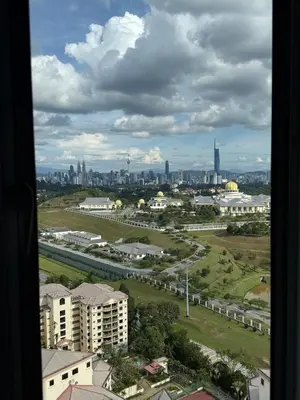 a view of a city from a window of a building at Cosy Studio Apartment at Hartamas in Kuala Lumpur