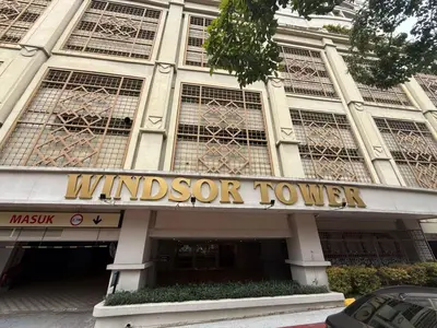 a building with a sign that reads wind super tower at Cosy Studio Apartment at Hartamas in Kuala Lumpur