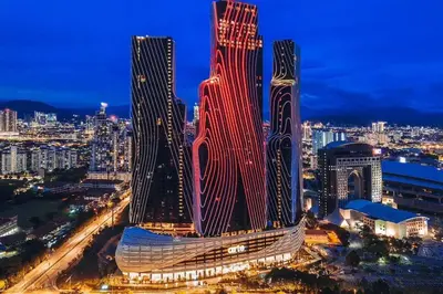 a large building is lit up at night at Arte mont kiara duplex 2 bedroom in Kuala Lumpur