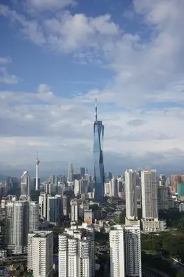 a view of a city with a tall skyscraper at Riveria City, Kl Sentral Studio Apartment near Monorail, Infinity Pool in Kuala Lumpur