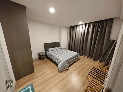 a bedroom with a bed in a room at The Atrium Jalan Ampang KLCC in Kuala Lumpur