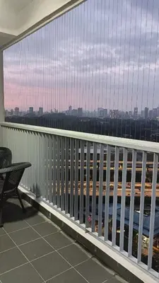 a balcony with a view of a city skyline at Twin Tower View Homestay Kuala Lumpur in Kuala Lumpur