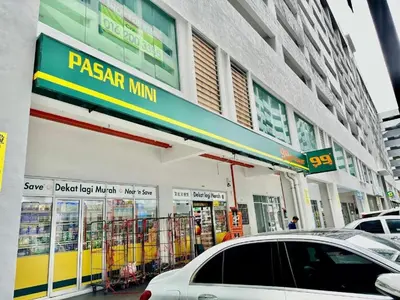a car parked in front of a gas station at Twin Tower View Homestay Kuala Lumpur in Kuala Lumpur