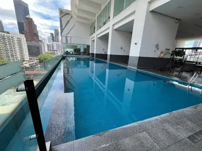 a large swimming pool on top of a building at Nice & convenient Studio in KL in Kuala Lumpur