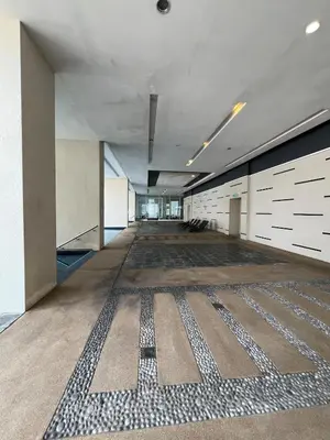 a large empty room with a rug on the floor at Convenient KLCCAmpang Park Unit in Kuala Lumpur