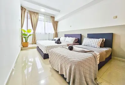 a bedroom with two beds and a window at Fahrenheit #185 Kuala Lumpur Bukit Bintang in Kuala Lumpur