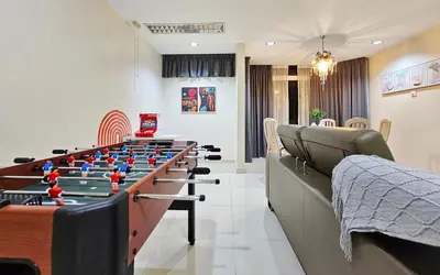 a room with a foos ball on a table at Bukit Bintang Fahrenheit #113 KLCC Kuala Lumpur in Kuala Lumpur