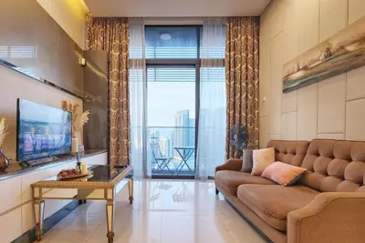 a living room with a couch and a table at Dorsett Residence #13 Kuala Lumpur Bukit Bintang TRX in Kuala Lumpur