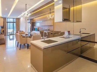 a large kitchen and dining room with a dining table at Dorsett Residence #13 Kuala Lumpur Bukit Bintang TRX in Kuala Lumpur