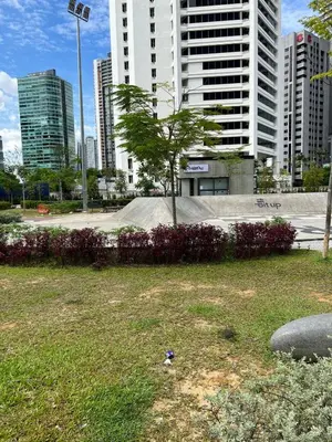 a park in a city with tall buildings at Great Value City Center Unit in Kuala Lumpur