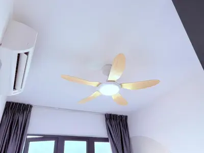 a ceiling fan in a room with a window at Perfect for Families & Larger Groups, KL MRT- M Vertica in Kuala Lumpur
