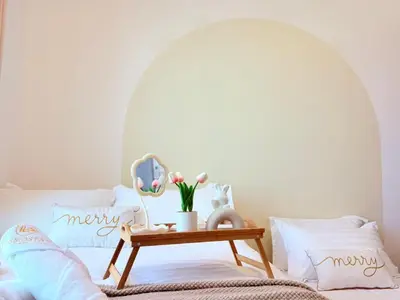 a bedroom with a bed with a table with a mirror at Perfect for Families & Larger Groups, KL MRT- M Vertica in Kuala Lumpur