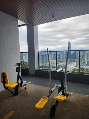 a room with two exercise bikes in a building at TRION Grand Service Suites at KL in Kuala Lumpur